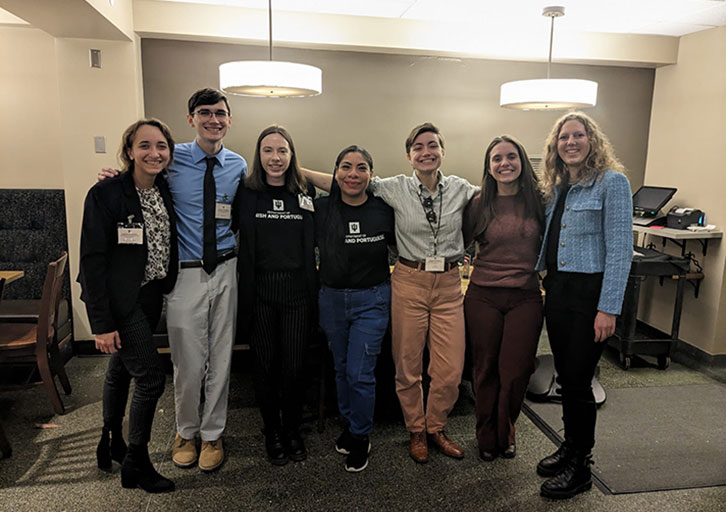 A group of academics pose together.